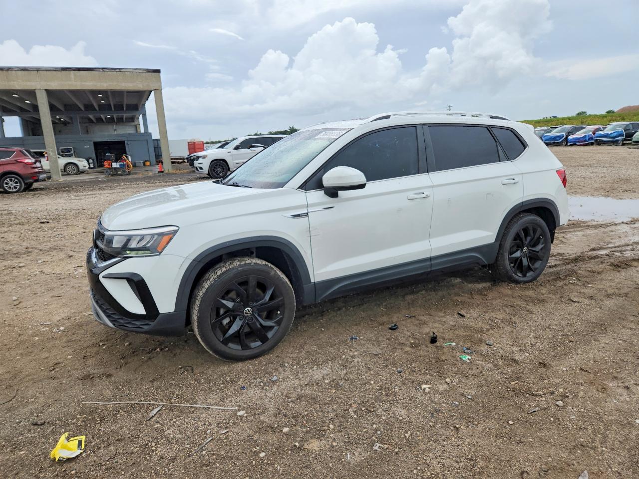 2022 Volkswagen Taos SE, VIN 3VVTX7B29NM078332 — Side