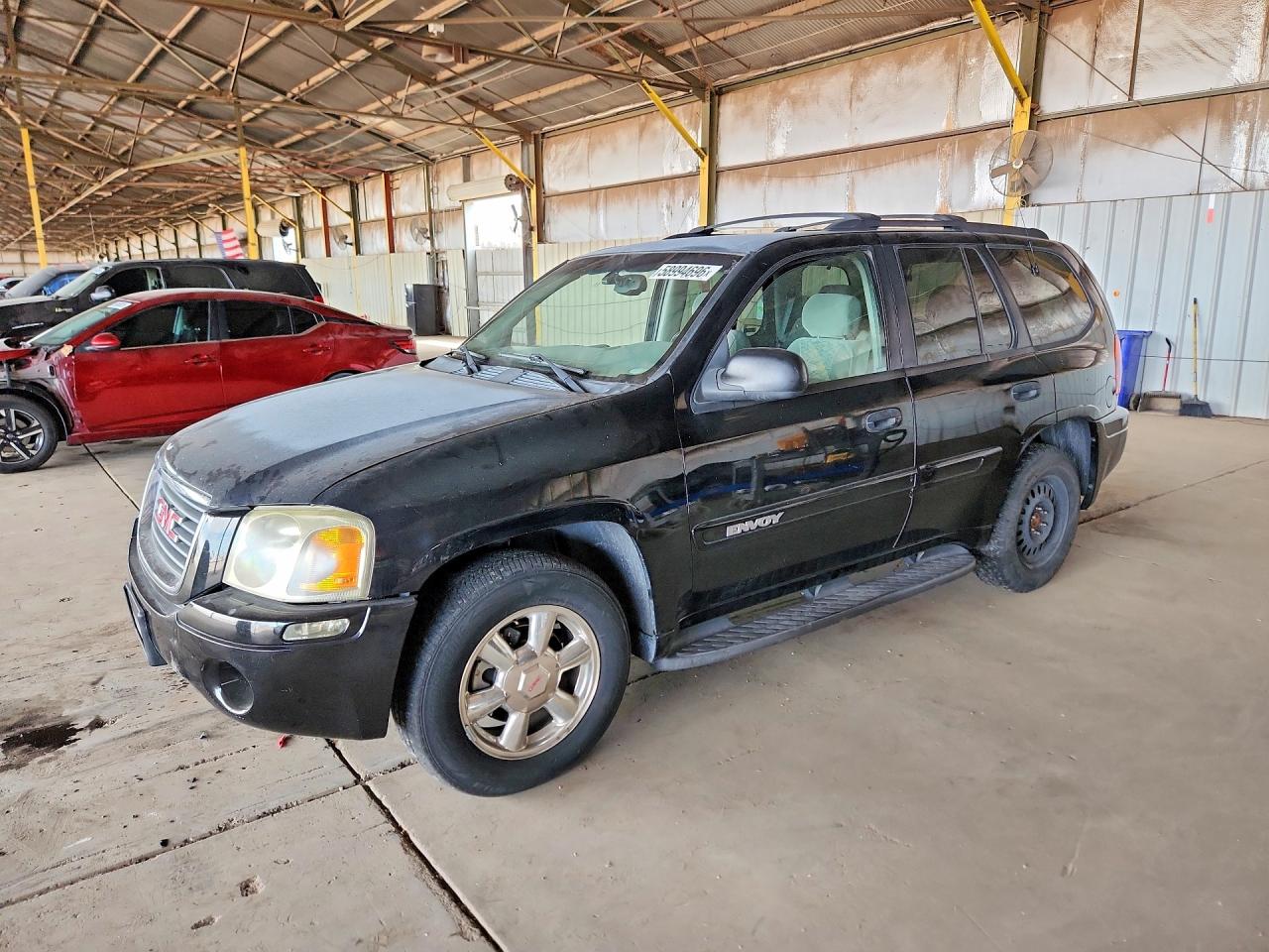 2002 GMC Envoy SLE, VIN 1GKDT13S222396133 — Minor dents and scratches