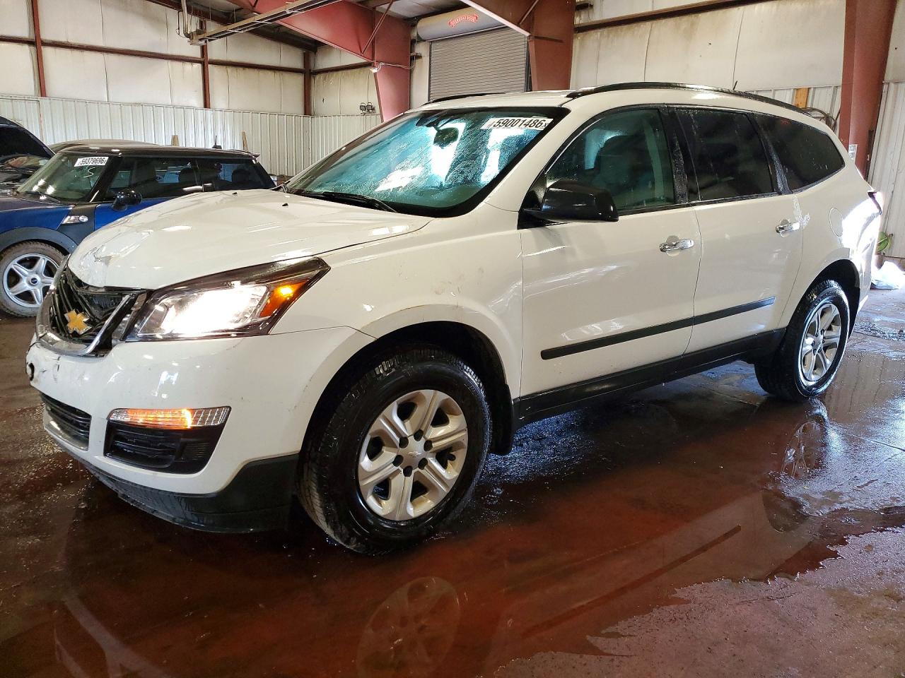 2017 Chevrolet Traverse LS, VIN 1GNKRFKD7HJ208505 — Front end
