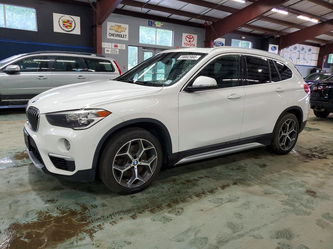 2018 BMW X1 xDrive28i, VIN WBXHT3C34J5L30734 — Minor dents and scratches
