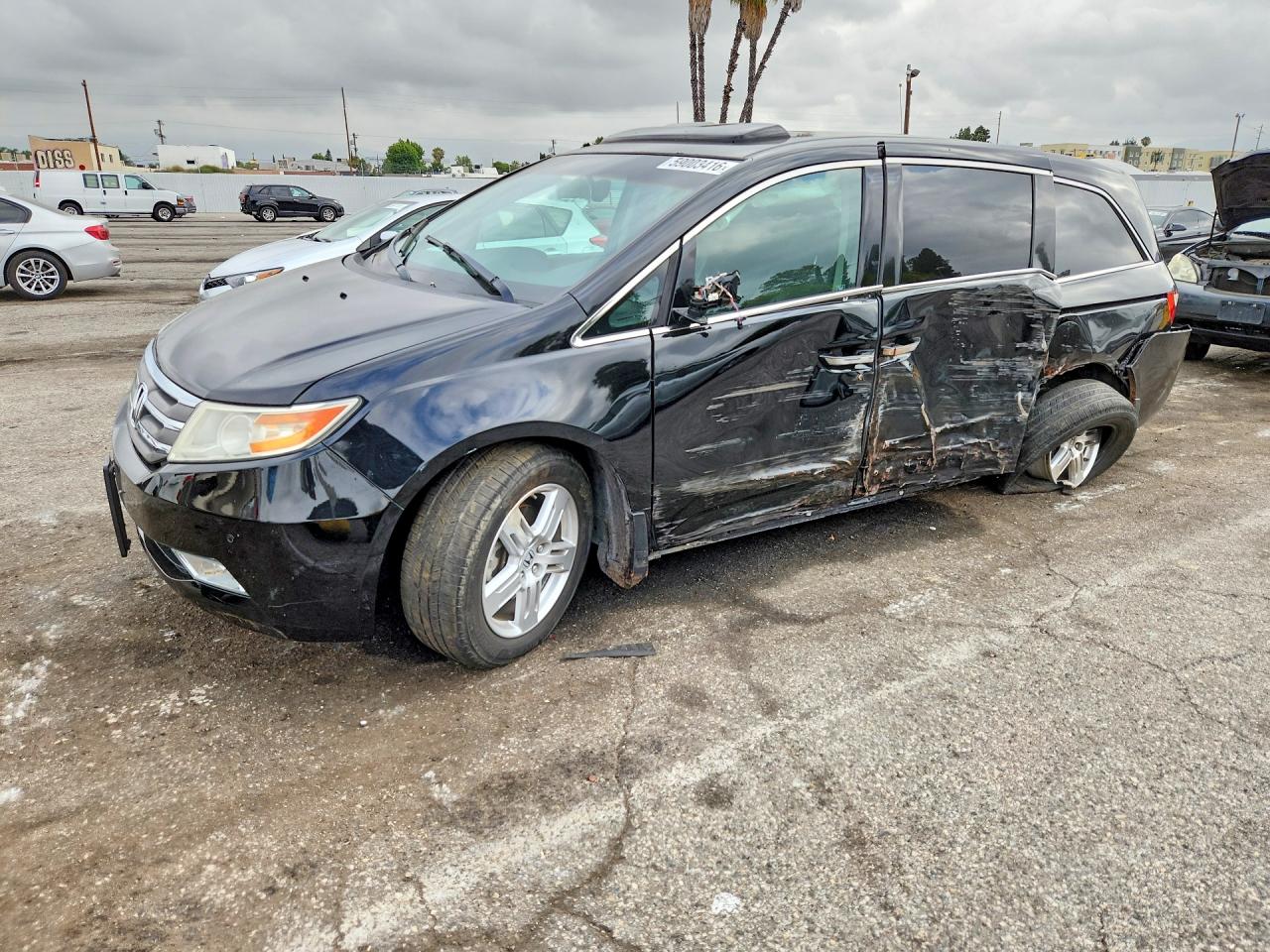 2011 Honda Odyssey Touring, VIN 5FNRL5H95BB049116 — Undercarriage