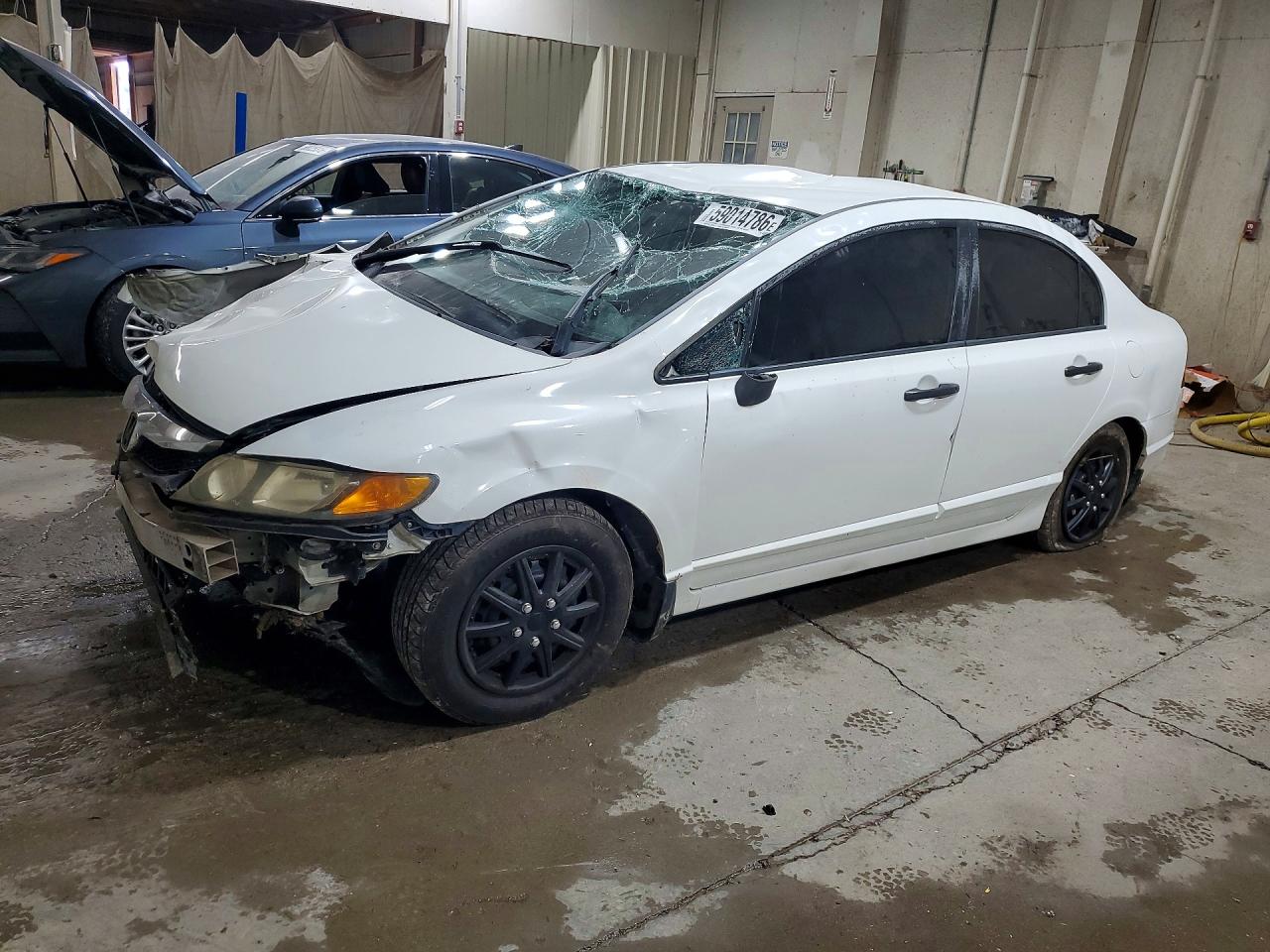 2010 Honda Civic DX-VP, VIN 2HGFA1E31AH509108 — Rollover