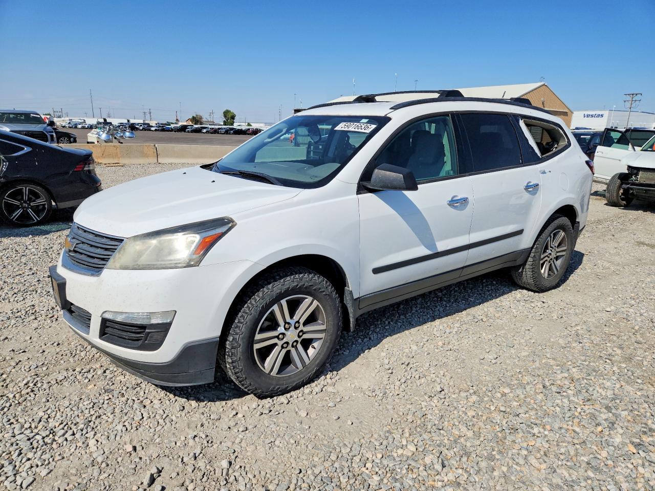 2017 Chevrolet Traverse LS, VIN 1GNKVFKD2HJ307194 — Hail