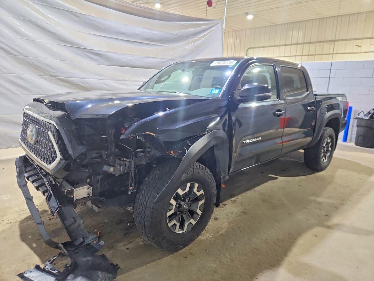 2019 Toyota Tacoma TRD Off Road, VIN 3TMCZ5ANXKM265132 — Front end
