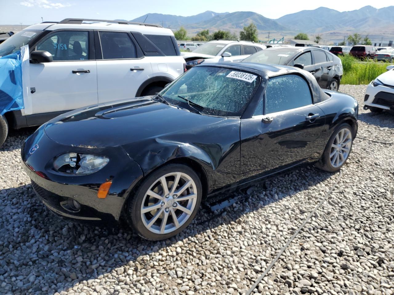 2006 Mazda MX-5 Miata Grand Touring, VIN JM1NC25FX60103537 — Side