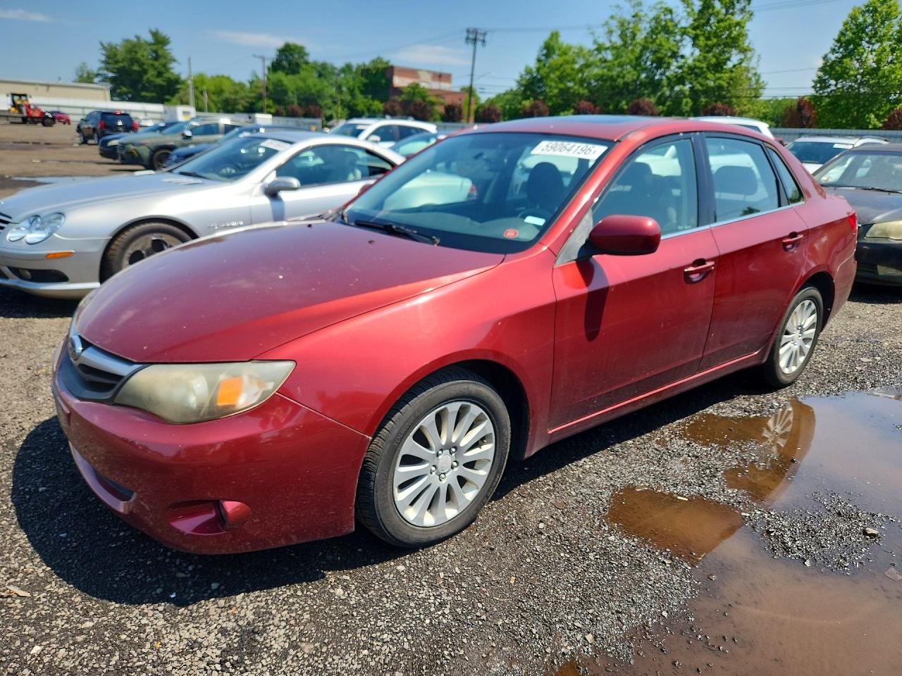 2010 Subaru Impreza i Premium, VIN JF1GE6B69AH513082 — Undercarriage