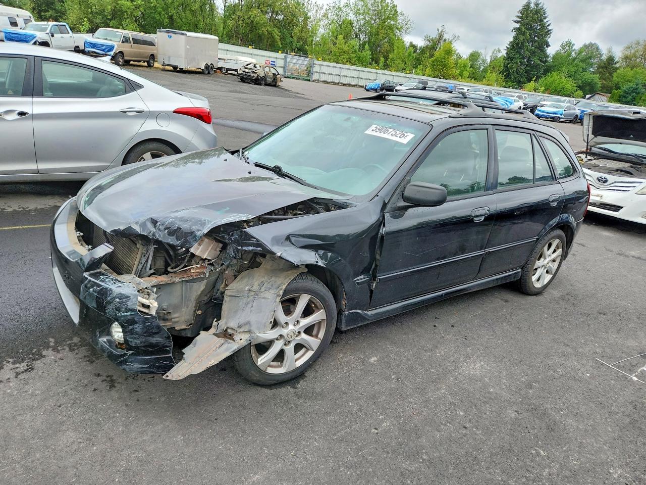 2002 Mazda Protege, VIN JM1BJ245421531173 — Front end