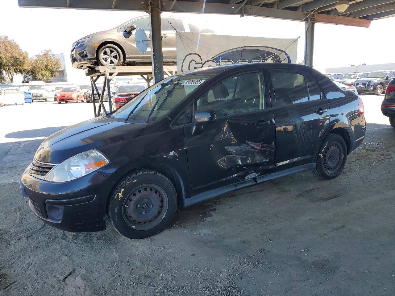 2011 Nissan Versa S, VIN 3N1BC1AP5BL446851 — Side
