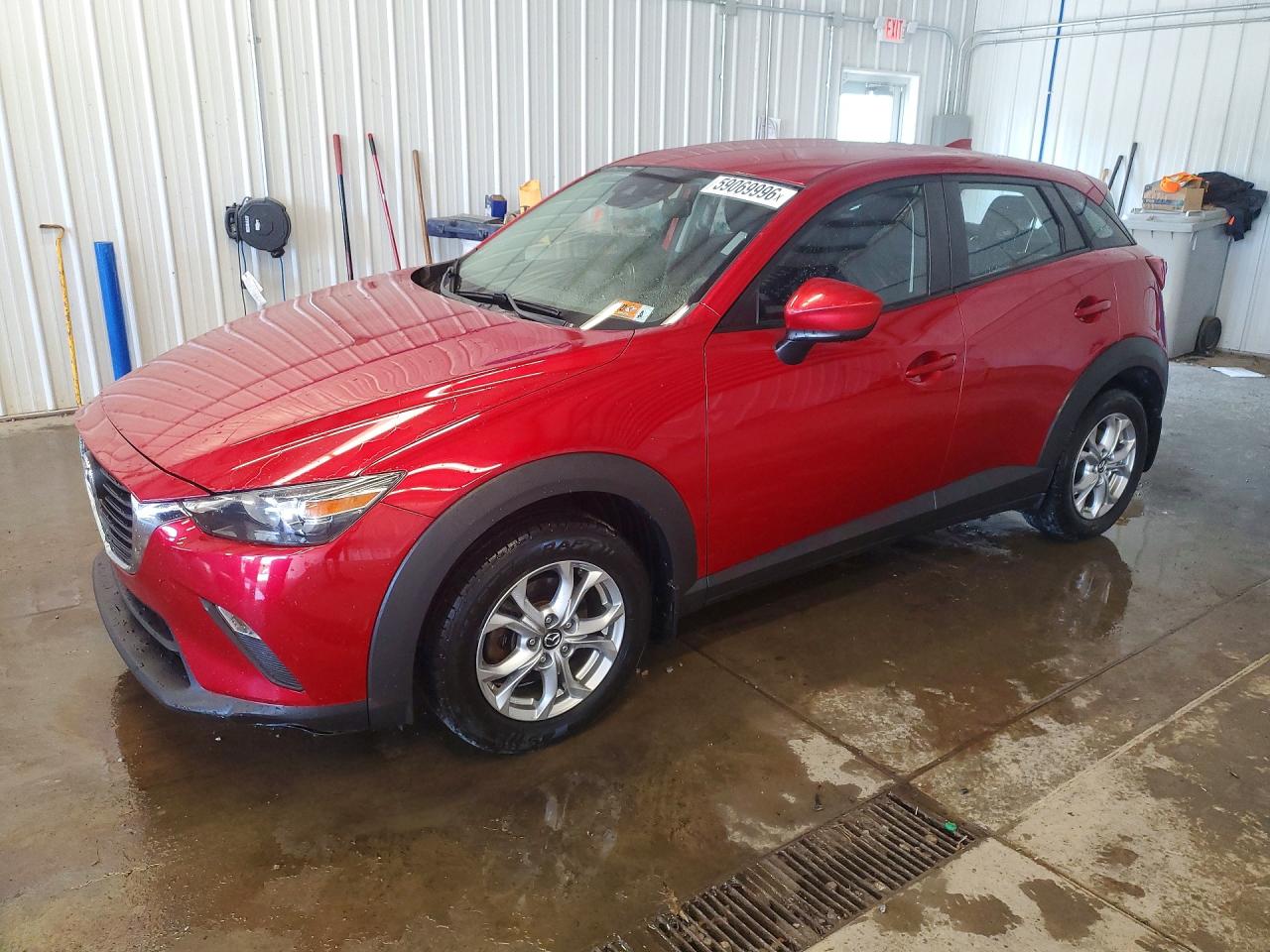 2018 Mazda CX-3 Sport, VIN JM1DKFB7XJ0317410 — Rear end
