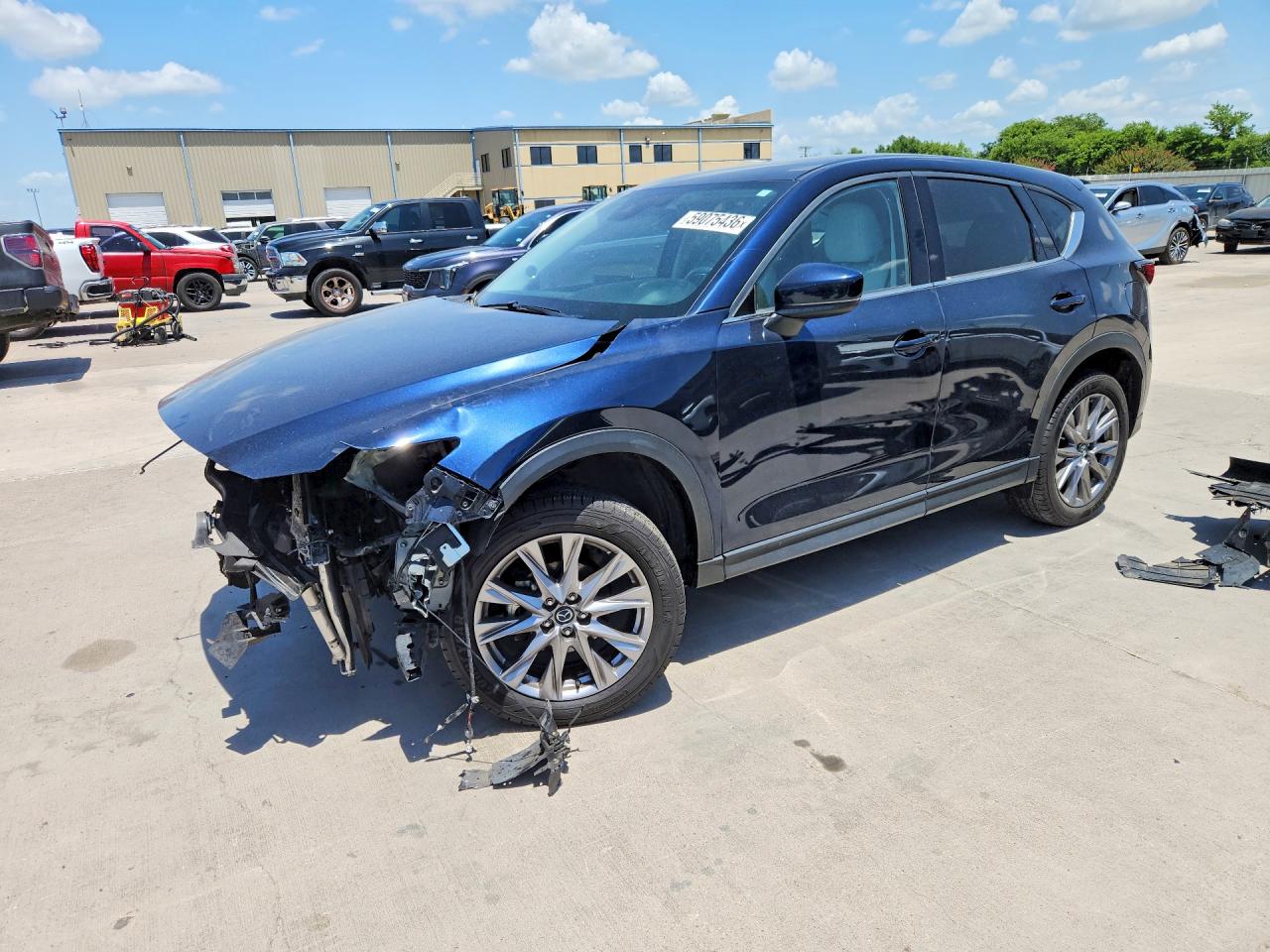 2021 Mazda CX-5 Grand Touring, VIN JM3KFBDM8M1398713 — Front end