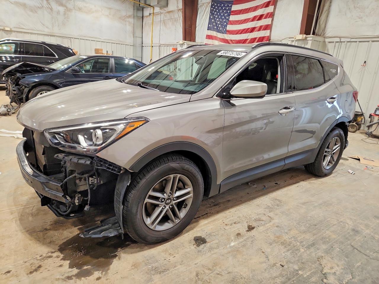2017 Hyundai Santa Fe 2.4L, VIN 5XYZUDLB6HG388809 — Front end