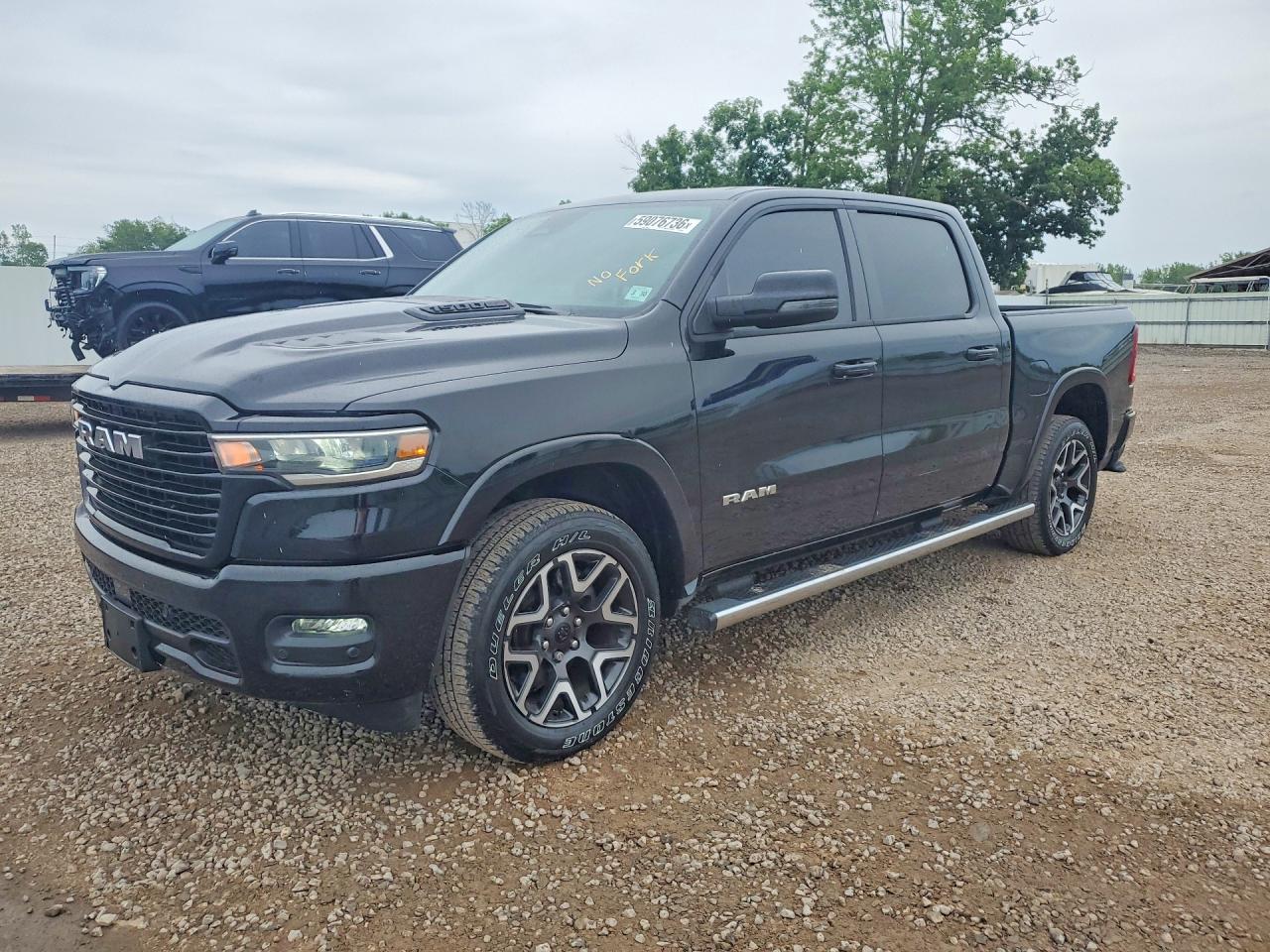 2025 Ram 1500 Laramie, VIN 1C6SRFJP4SN582470 — Minor dents and scratches