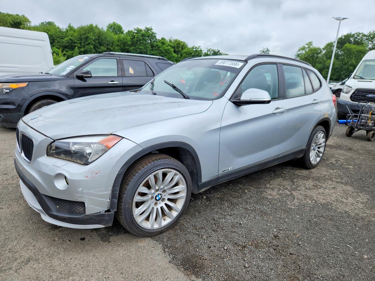 2015 BMW X1 xDrive28i, VIN WBAVL1C58FVY32527 — Minor dents and scratches