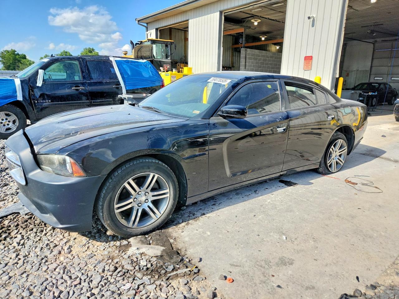 2013 Dodge Charger SE, VIN 2C3CDXBG0DH639943 — Side