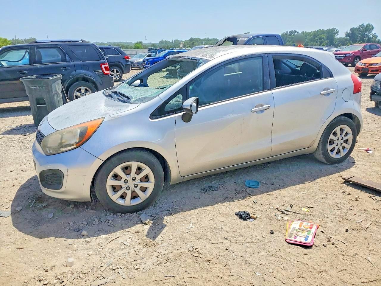2012 Kia Rio LX, VIN KNADM5A31C6036502 — Vandalism