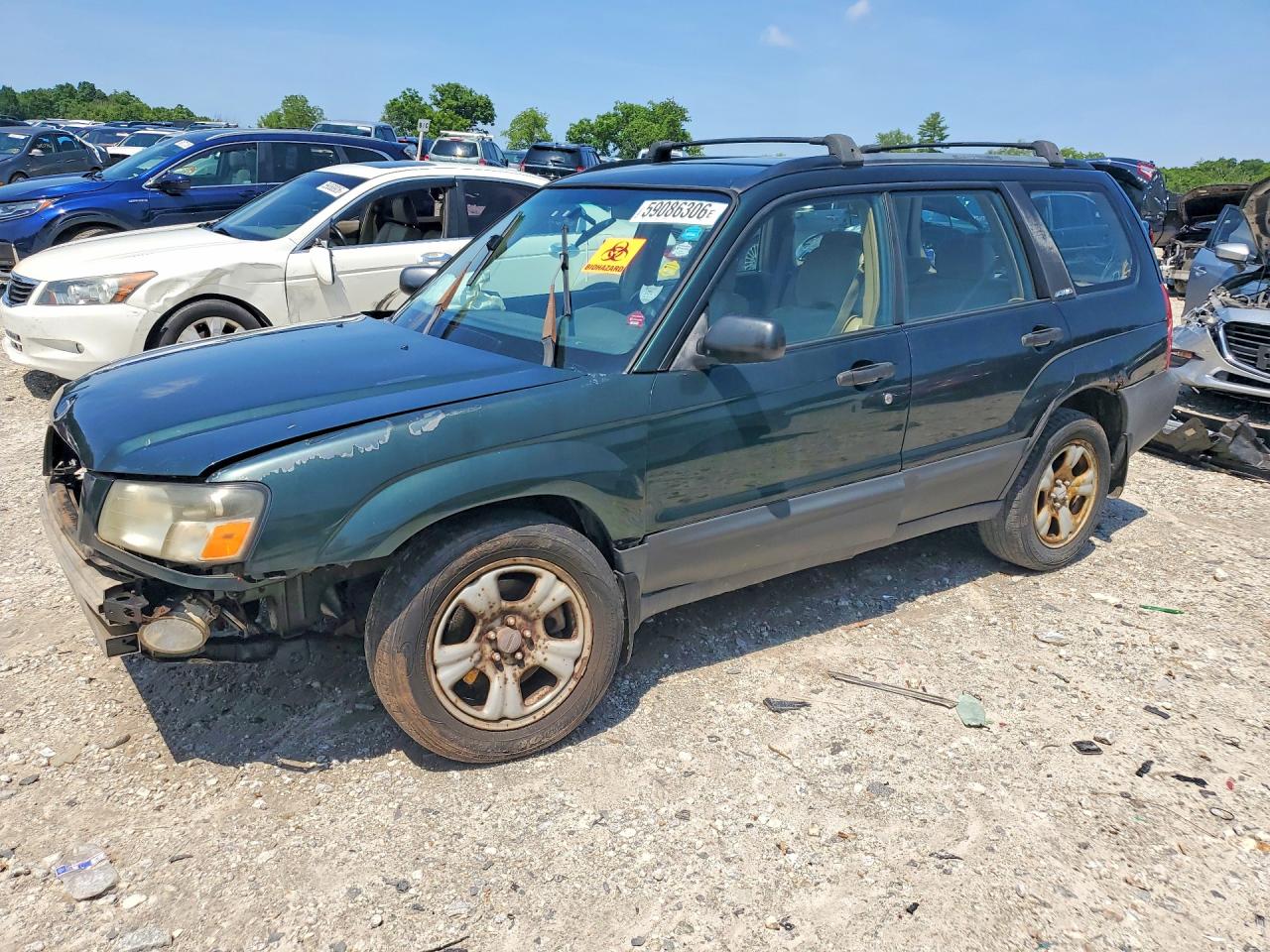 2003 Subaru Forester X, VIN JF1SG63673H752247 — Undercarriage
