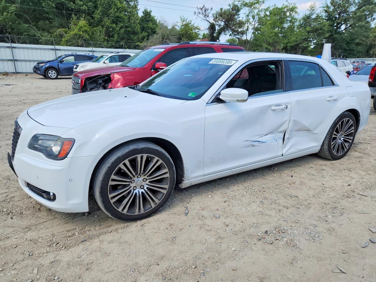 2012 Chrysler 300 S, VIN 2C3CCADTXCH232799 — Бок