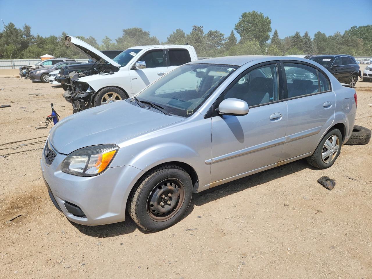 2010 Kia Rio LX, VIN KNADH4A34A6682855 — Rear end