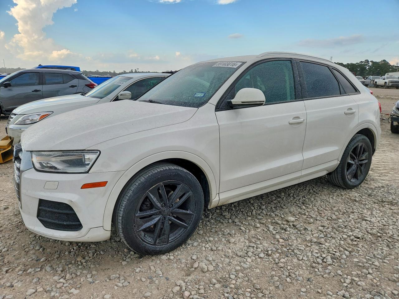 2017 Audi Q3 Premium, VIN WA1ECCFS6HR015658 — Minor dents and scratches