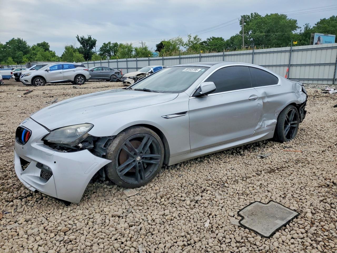 2012 BMW 6 Series 650i, VIN WBALX3C53CDV77374 — Side
