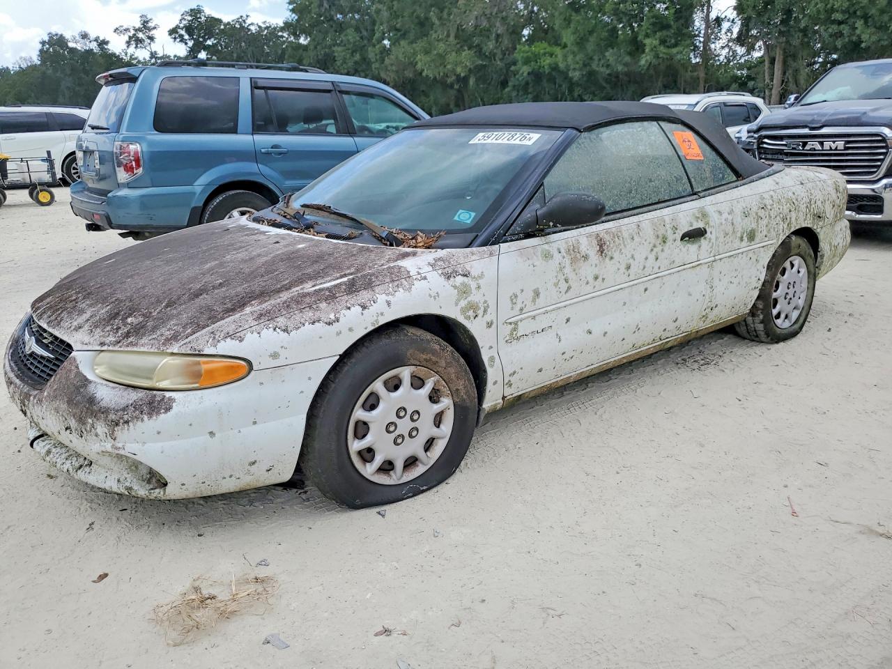 2000 Chrysler Sebring JX, VIN 3C3EL45H4YT231196 — Minor dents and scratches