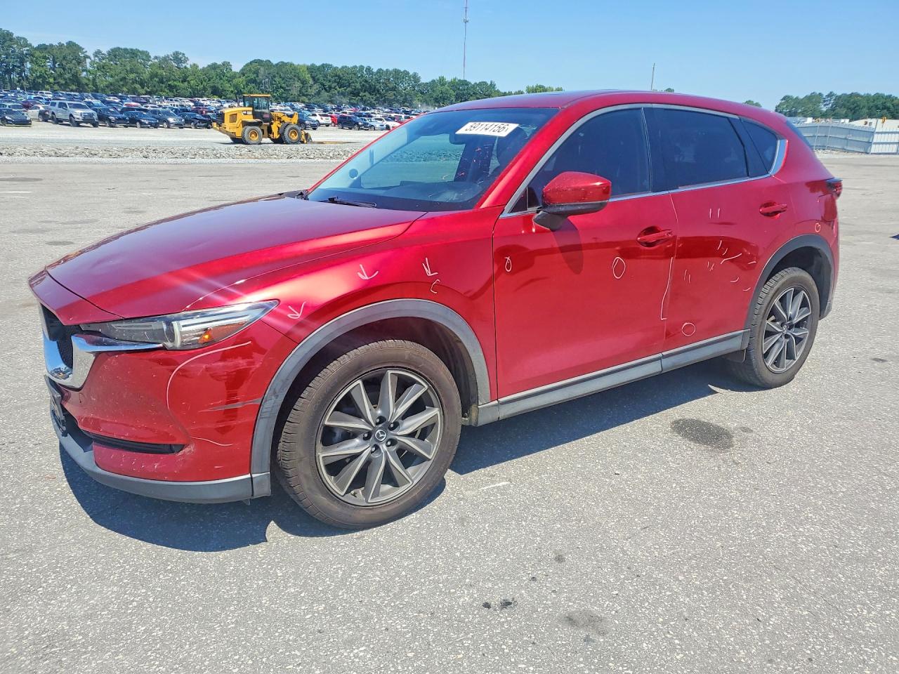 2017 Mazda CX-5 Grand Touring, VIN JM3KFADL7H0122164 — Side
