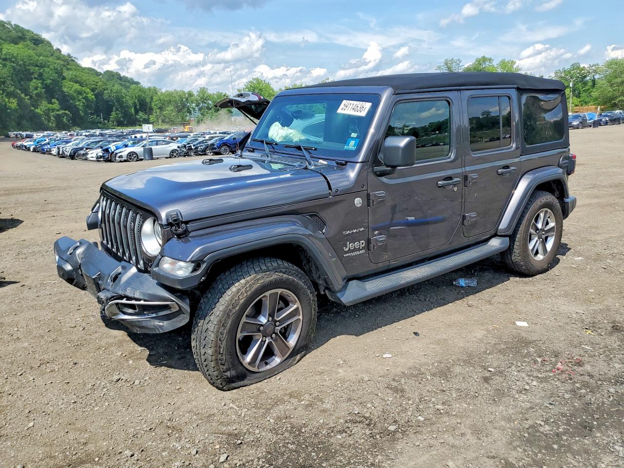 2018 Jeep Wrangler Unlimited Sahara, VIN 1C4HJXEG4JW308673 — Front end