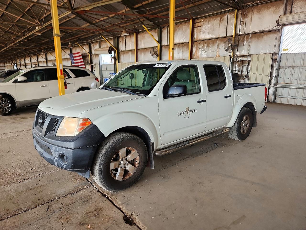 2009 Nissan Frontier SE, VIN 1N6AD07U29C403925 — Minor dents and scratches