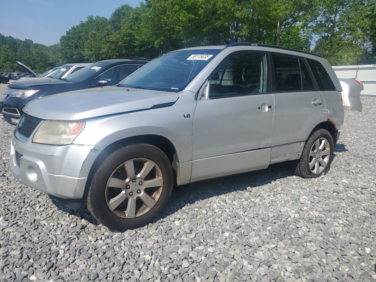 2010 Suzuki Grand Vitara Limited, VIN JS3TE1D95A4110194 — Rear end