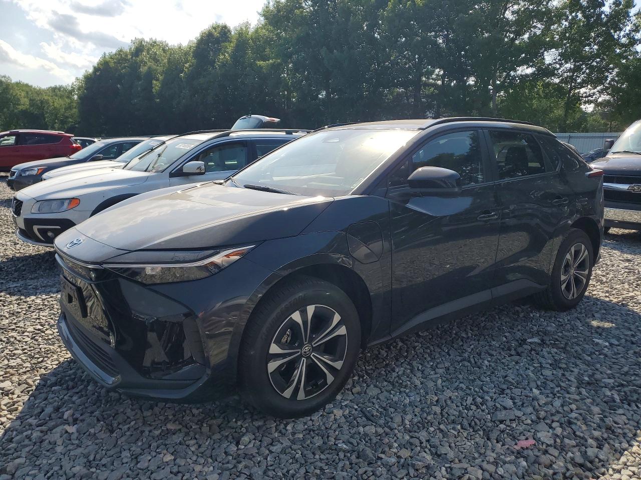 2025 Toyota bZ4X XLE, VIN JTMAAAAA6SA073563 — Side