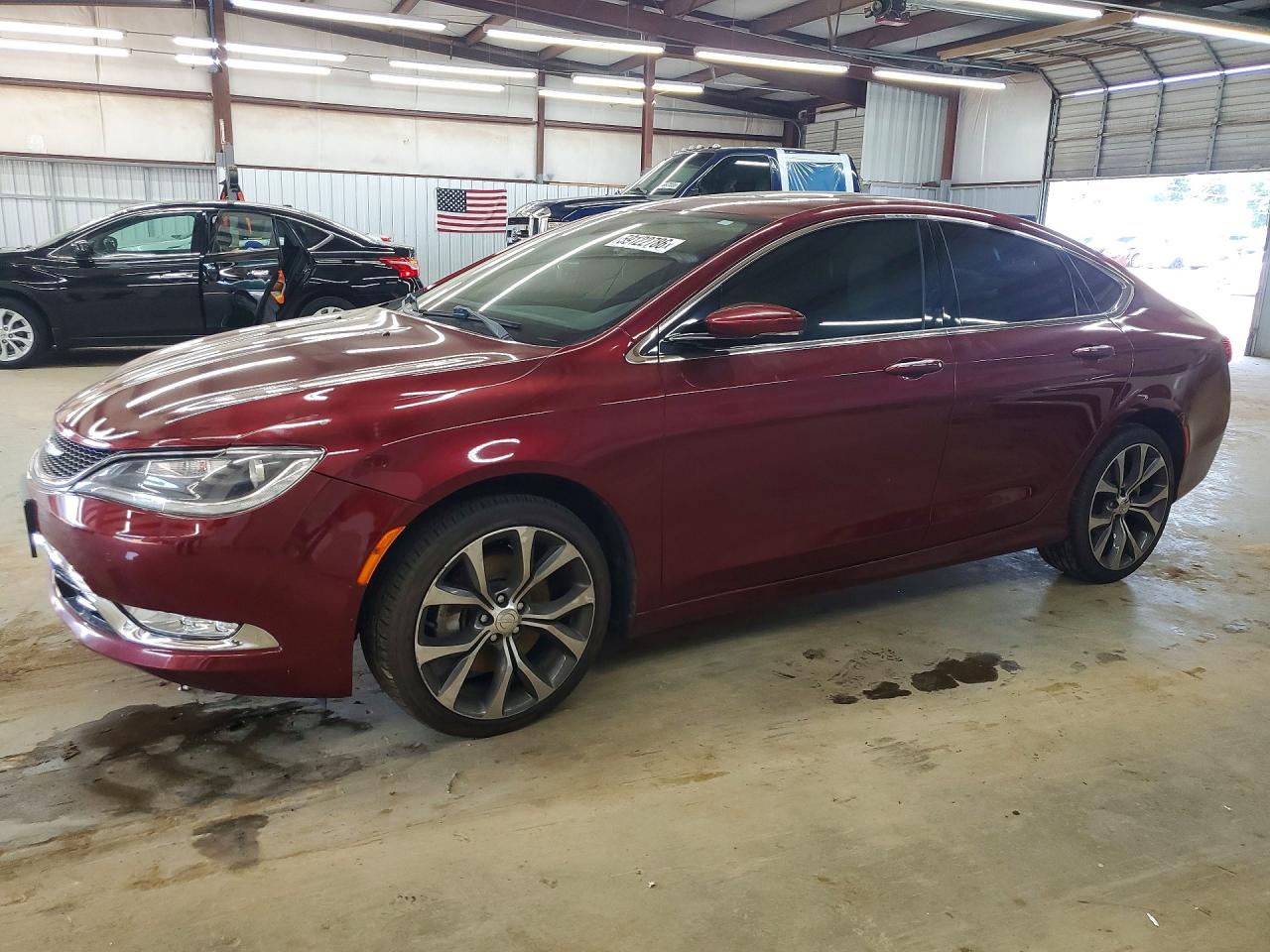 2015 Chrysler 200 C, VIN 1C3CCCCGXFN564737 — Side