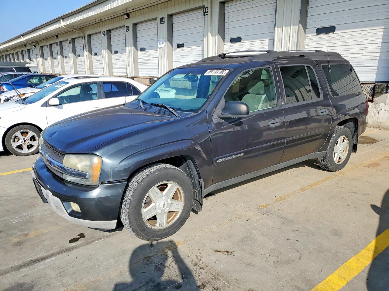 2003 Chevrolet TrailBlazer EXT LT, VIN 1GNES16S836239626 — Side