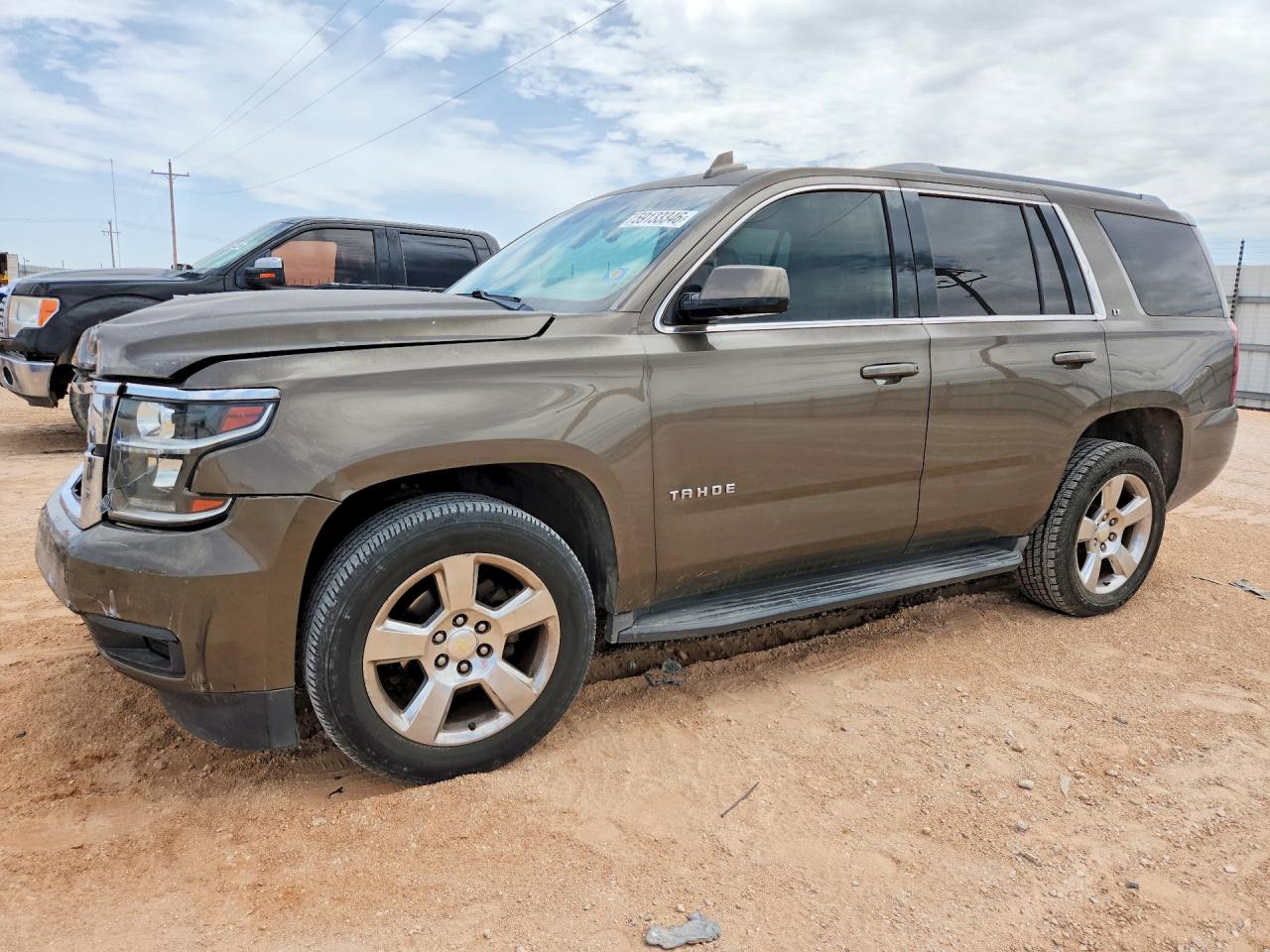 2016 Chevrolet Tahoe LT, VIN 1GNSCBKC6GR200638 — Front end