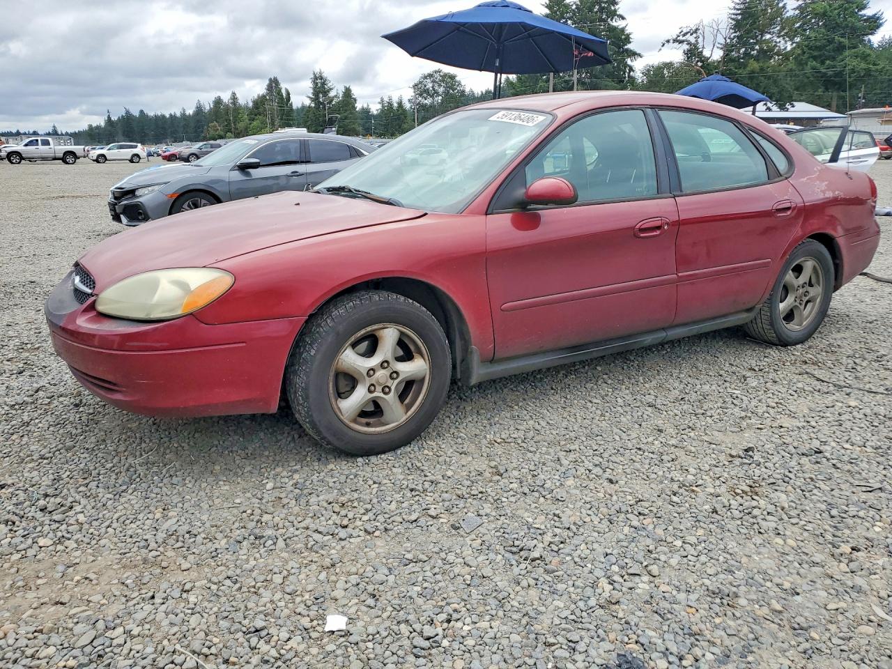 2002 Ford Taurus SES Standard, VIN 1FAFP55U02G232869 — Side