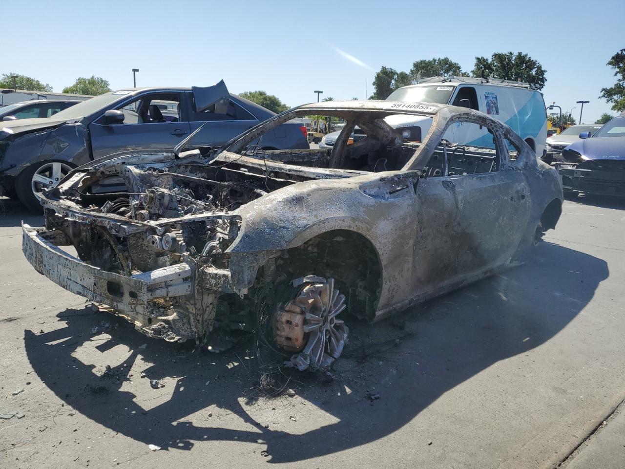 2014 Scion FR-S, VIN JF1ZNAA1XE8705411 — Vandalism