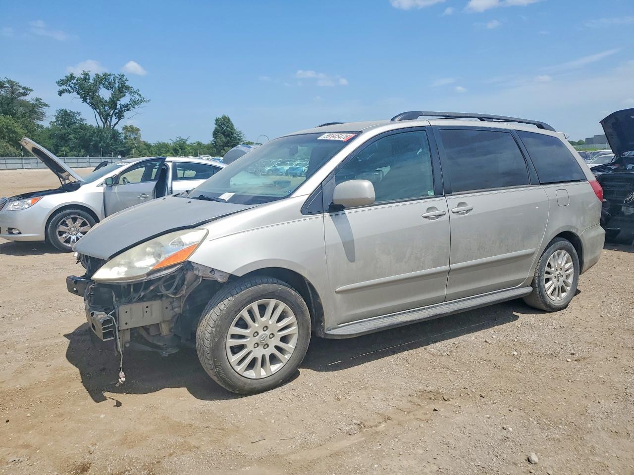 2009 Toyota Sienna XLE Limited, VIN 5TDZK22C89S236815 — Front end