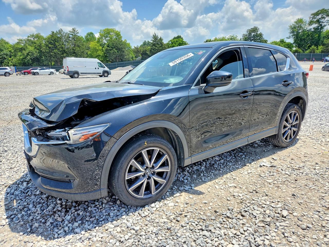 2017 Mazda CX-5 Grand Touring, VIN JM3KFADL3H0134148 — Front end