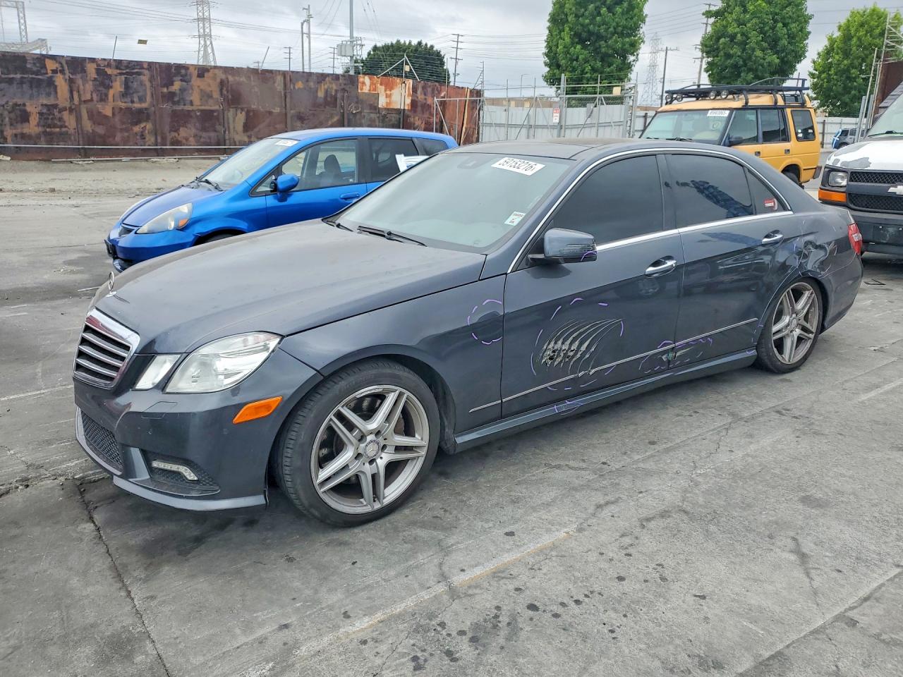 2011 Mercedes-Benz E 550 Luxury, VIN WDDHF7CB6BA420999 — Side