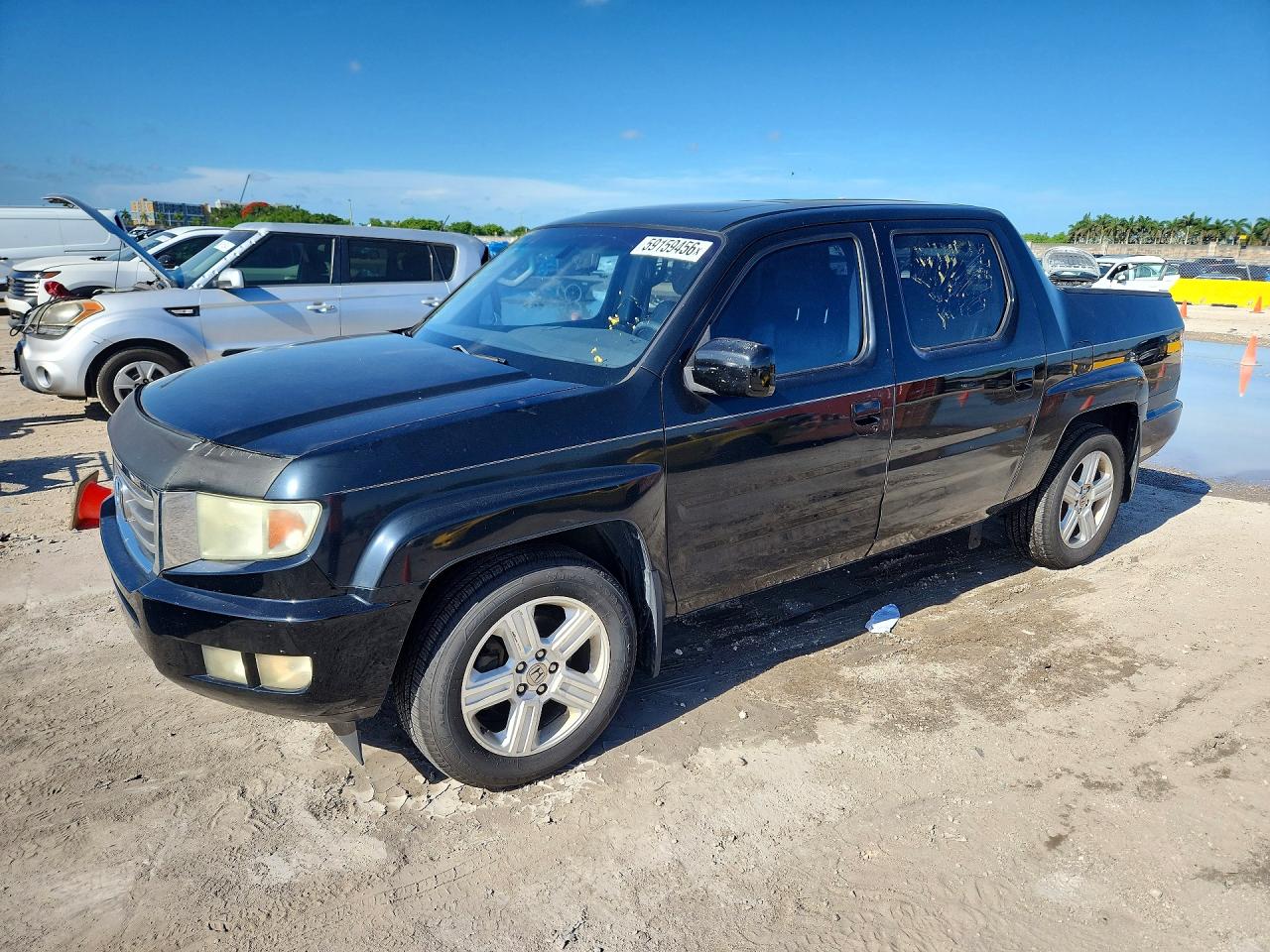 2012 Honda Ridgeline RTL, VIN 5FPYK1F51CB453787 — Front end