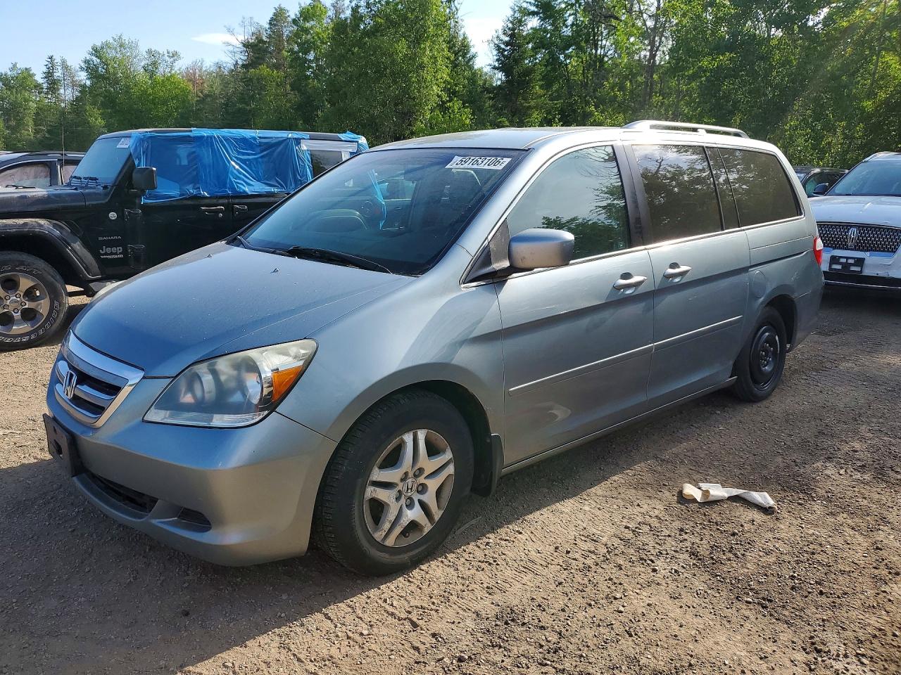 2006 Honda Odyssey EX, VIN 5FNRL38436B125706 — Бок