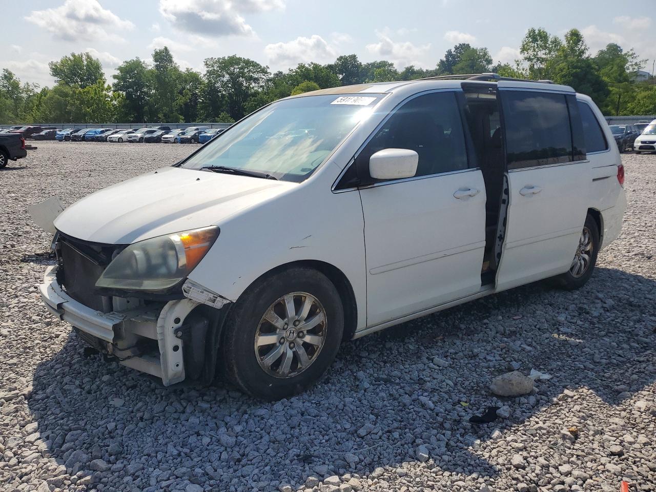 2009 Honda Odyssey EX-L, VIN 5FNRL38759B408204 — Front end