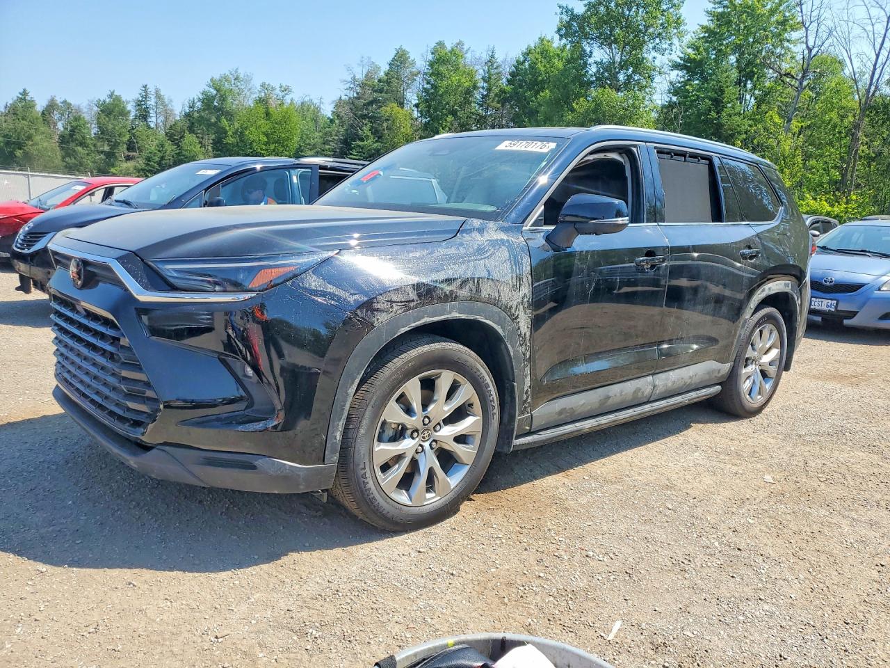 2025 Toyota Grand Highlander Hybrid Limited, VIN 5TDACAB55SS034865 — Бок