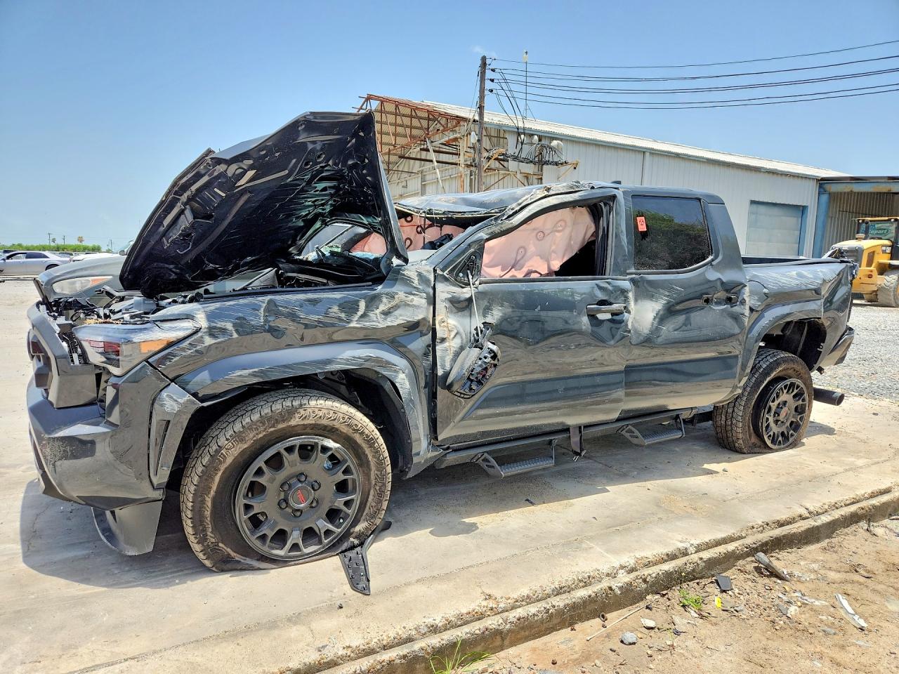 2026 Toyota Tacoma SR, VIN 3TYKD5HN2TT052780 — По всему кузову