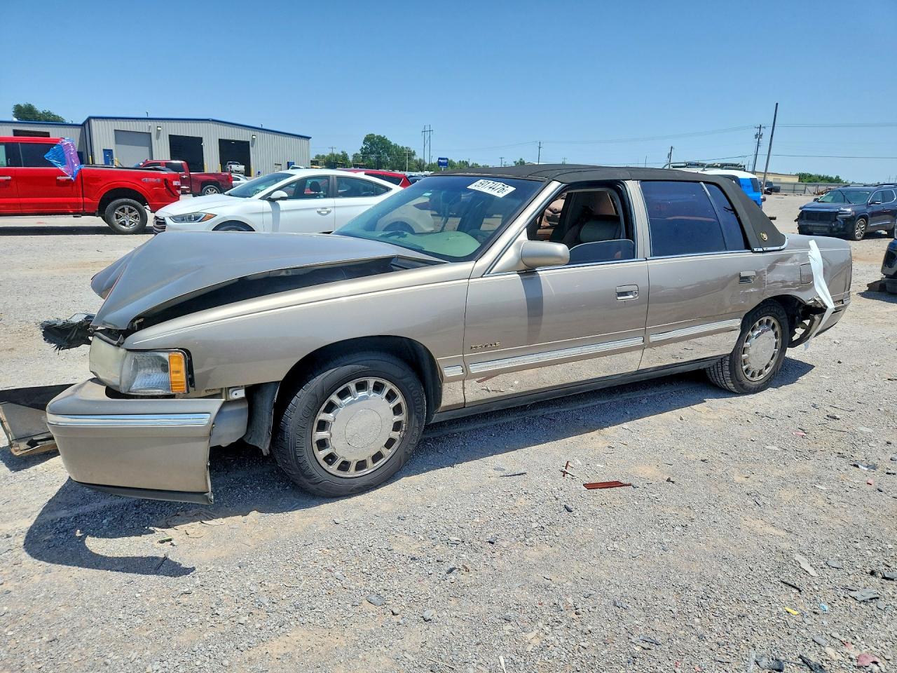 1999 Cadillac DeVille, VIN 1G6KD54Y3XU787459 — Front end