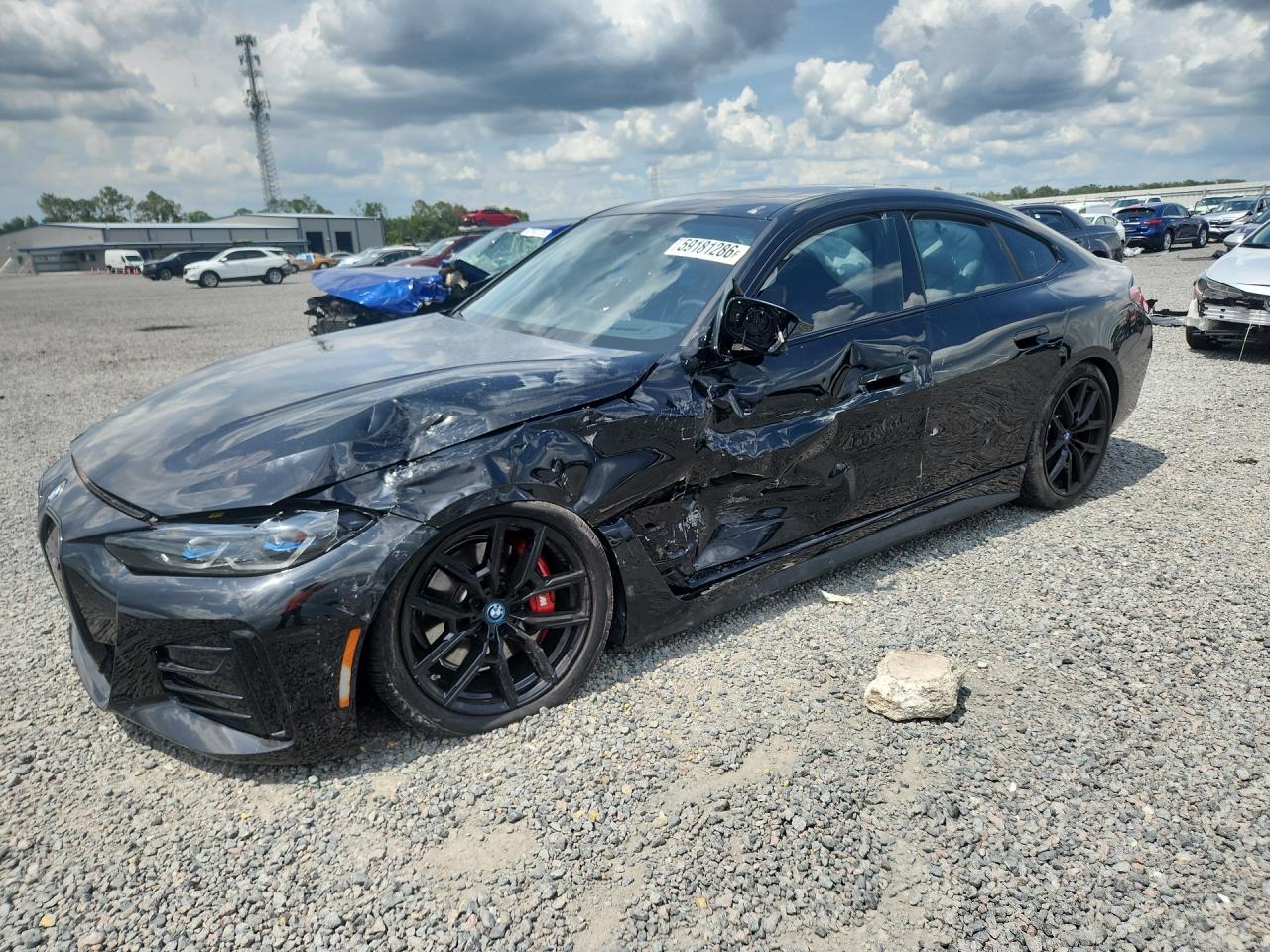 2023 BMW i4 M50, VIN WBY33AW04PFN30530 — Side