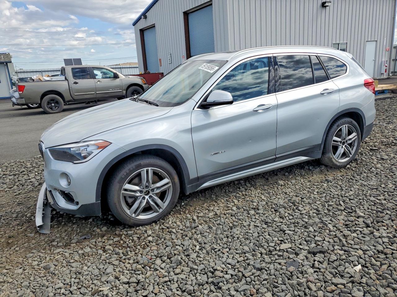 2018 BMW X1 xDrive28i, VIN WBXHT3C34J5K27636 — Front end