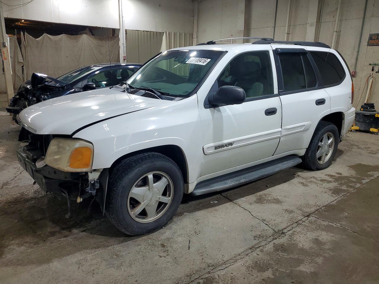 2003 GMC Envoy SLT, VIN 1GKDS13S632350132 — Side