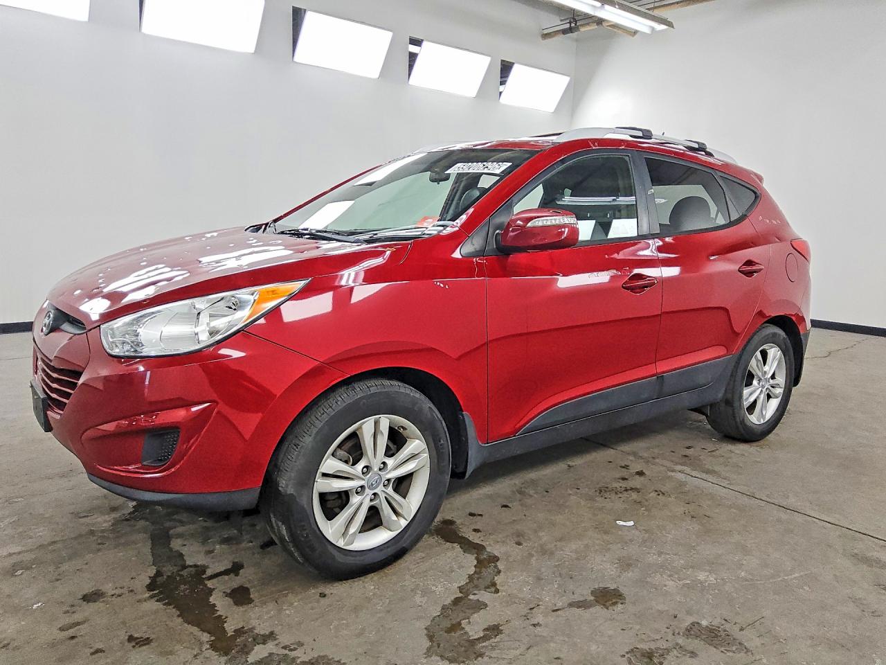 2012 Hyundai Tucson GLS, VIN KM8JU3AC8CU345028 — Hail