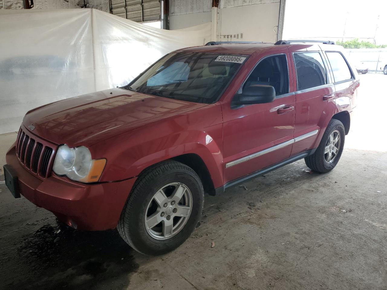 2010 Jeep Grand Cherokee Laredo, VIN 1J4PR4GK0AC116750 — Rear end