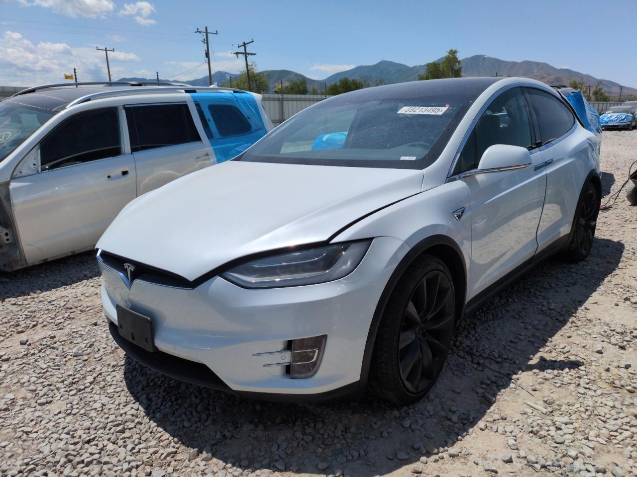 2019 Tesla Model X 75D, VIN 5YJXCAE23KF207766 — Rear end